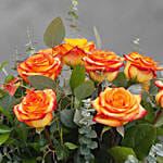 12 Beautiful Orange Roses Glass Vase Arrangement