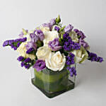 Fascinating White Roses Purple Flowers in Glass Vase