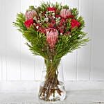 Protia And Red Roses Arrangement In Vase
