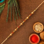 Traditional Golden Pearl Rakhi And Healthy Almonds