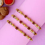 Traditional Pearl Studded Rakhi Trio And Healthy Almonds