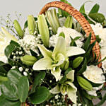 White Lilies & Carnations In Handle Cane Basket
