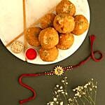 Sneh Gold Floral Rakhi & Besan Ladoos